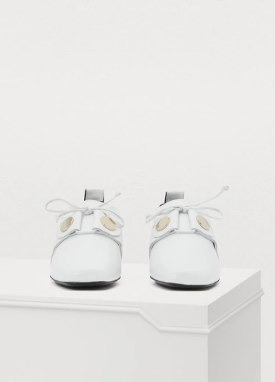 Shop Pierre Hardy Penny Derbies In White