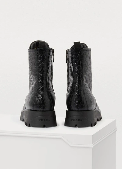 Shop Prada Compact Croco Ankle Boots In Black