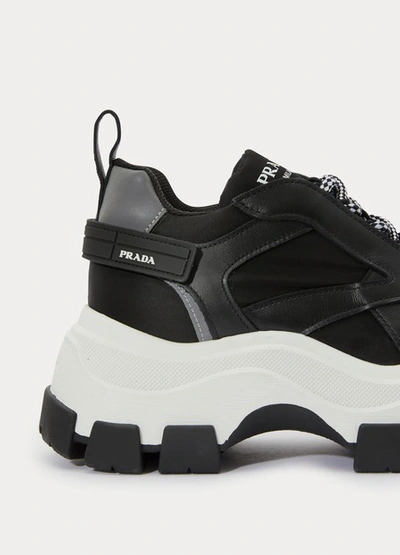 Shop Prada Pegasus Trainers In Black