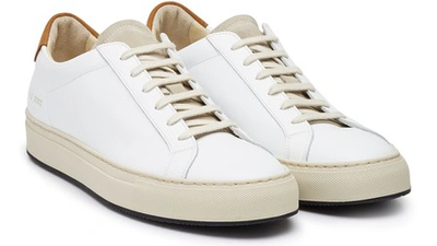 Shop Common Projects Achilles Retro Trainers In White / Tan