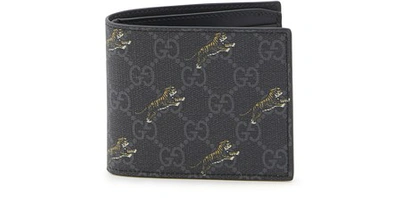Shop Gucci Gg Tiger Print Wallet In Black