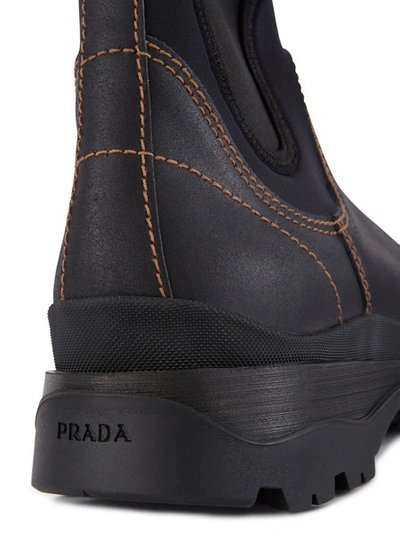 Shop Prada Brixxen Ankle Boots In Black