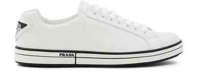 Shop Prada Badge Leather Trainers In White