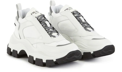 Shop Prada Trainers In Bianco/nero