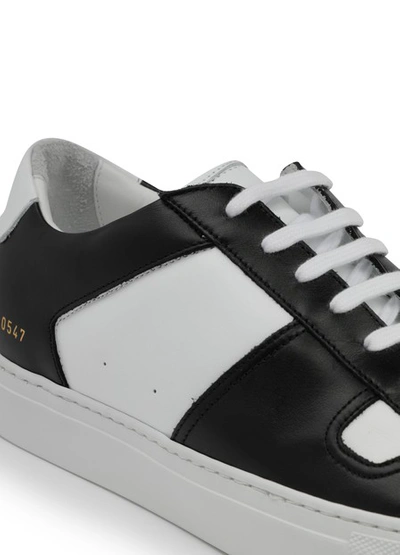 Shop Common Projects Bball Trainers In White/black