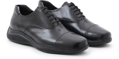 Shop Prada Brushed Leather Oxford Shoes In Black