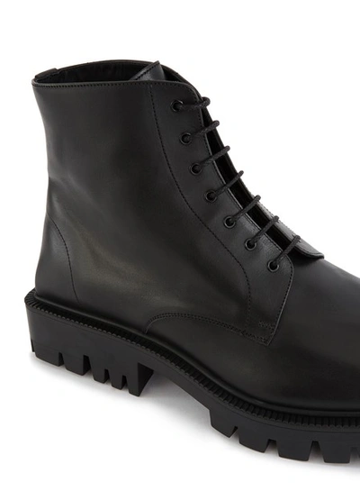 Shop Balenciaga Leather Ankle Boots In 1000