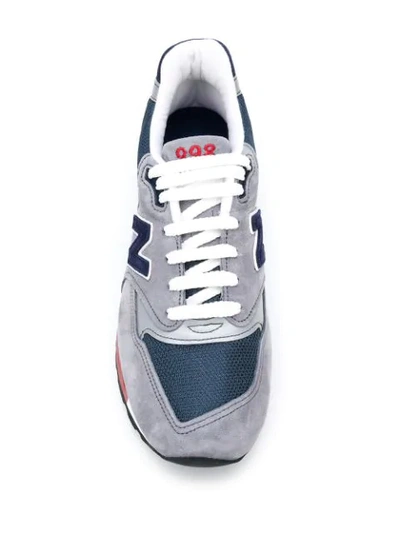 Shop New Balance Logo Embroidered Sneakers In Grey