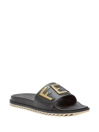 Shop Fendi Logo Embossed Sandals In Black