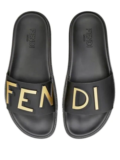 Shop Fendi Logo Embossed Sandals In Black