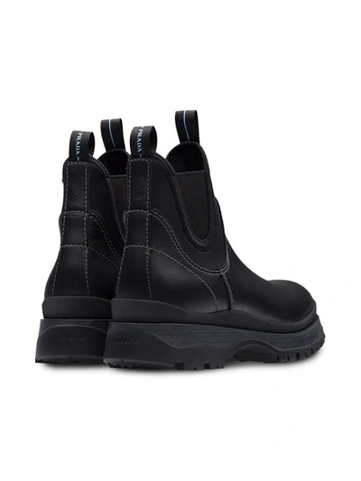 Shop Prada Brixen Rain Boots In Black