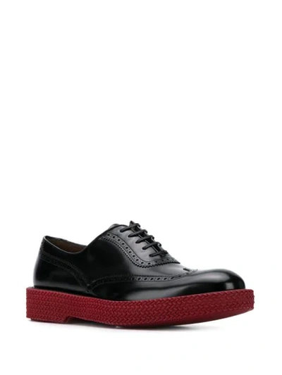 Shop Ferragamo Schuhe Mit Kontrastsohle In Black