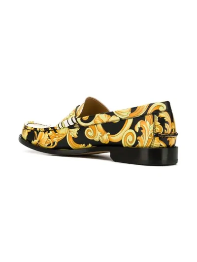 Shop Versace Hibiscus Print Leather Loafers In Black