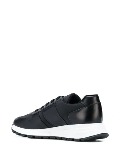 Shop Prada Low Top Sneakers In Black