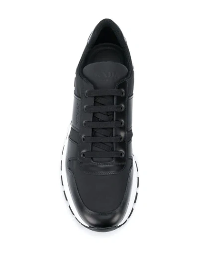 Shop Prada Low Top Sneakers In Black