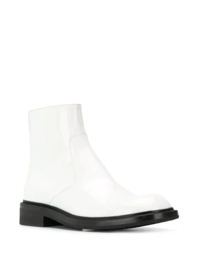 Shop Prada Round Toe Ankle Boots In F0009  Bianco
