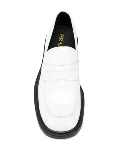 Shop Prada Penny Loafers In White