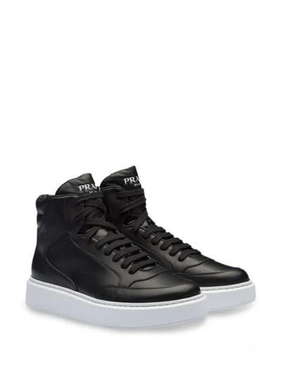 Shop Prada Hi-tops Sneakers In Black