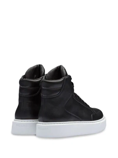 Shop Prada Hi-tops Sneakers In Black