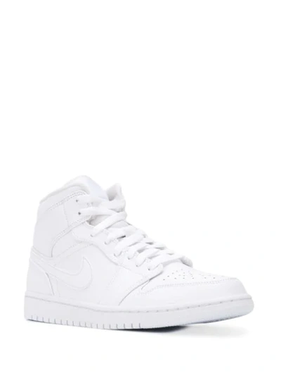 Shop Nike Air Jordan 1 Sneakers In White