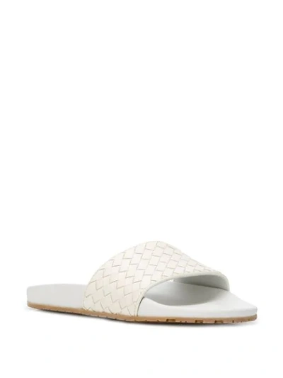 Shop Bottega Veneta Basket Woven Slides In White