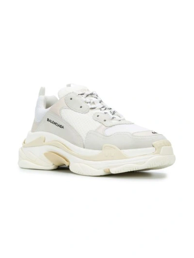 Shop Balenciaga Triple S Sneakers In White