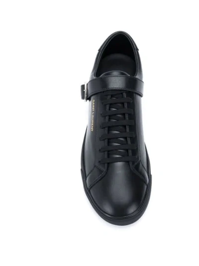 Shop Saint Laurent Andy Buckled Sneakers In Black