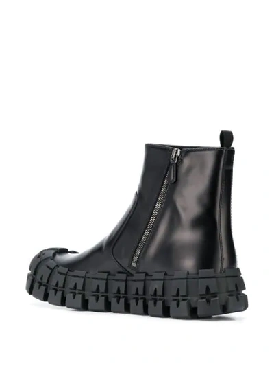 Shop Prada Deconstructed Chunky Leather Boots In F0002 Nero