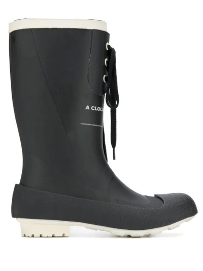 Shop Undercover Lace-up Rubber Boots In Black