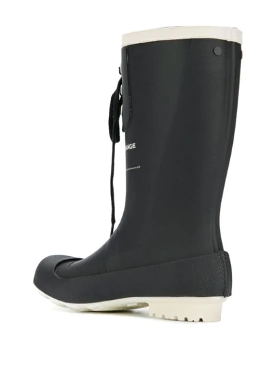 Shop Undercover Lace-up Rubber Boots In Black