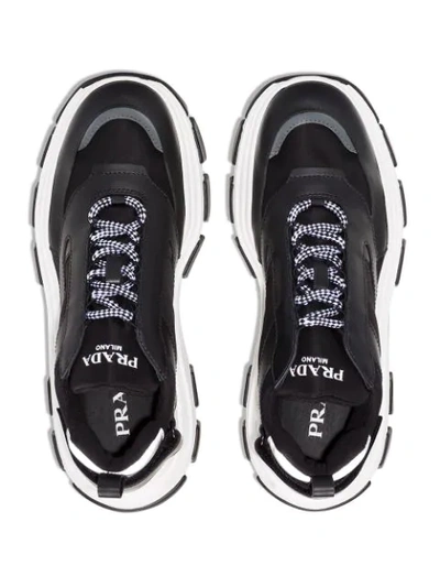 Shop Prada Pegasus Chunky Sneakers In Black