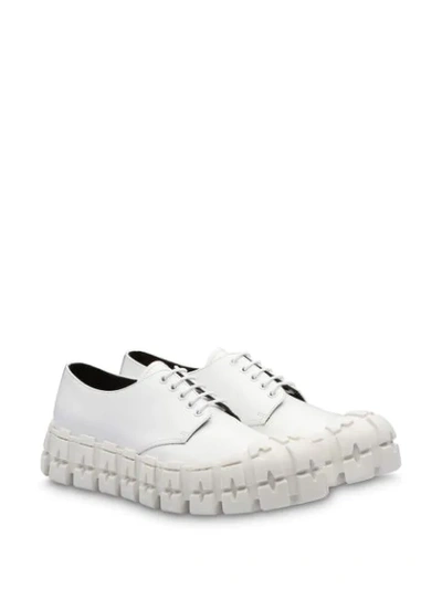 Shop Prada Brushed Derby Shoes In White