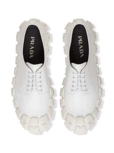 Shop Prada Brushed Derby Shoes In White