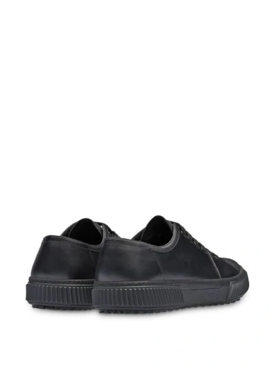 Shop Prada Low Top Sneakers - Black
