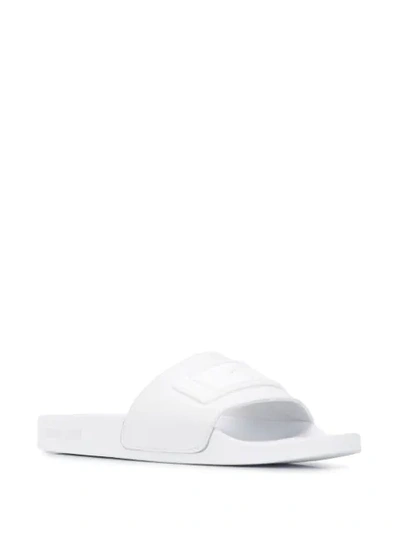 Shop Roberto Cavalli Logo Embossed Slides In White