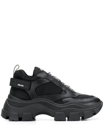 Shop Prada Pegasus Sneakers In Black