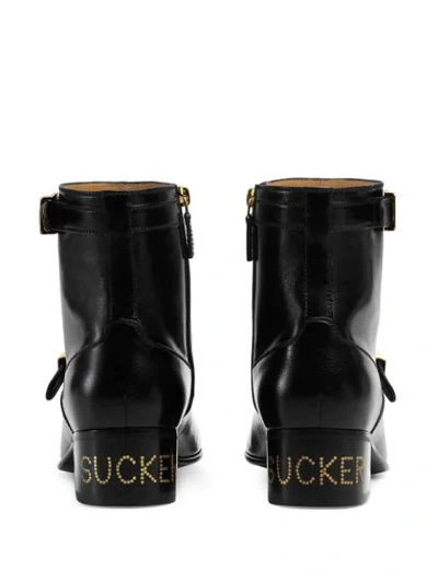 Shop Gucci Sucker Buckle Boots In Black