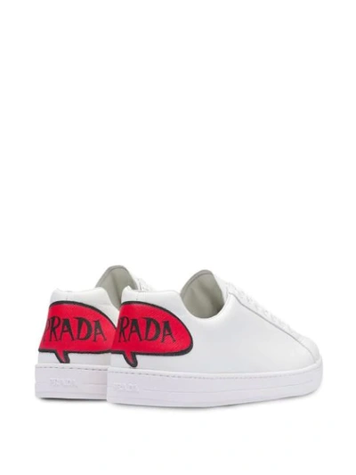 Shop Prada Leather Sneakers With Comics Patch - Weiss In White