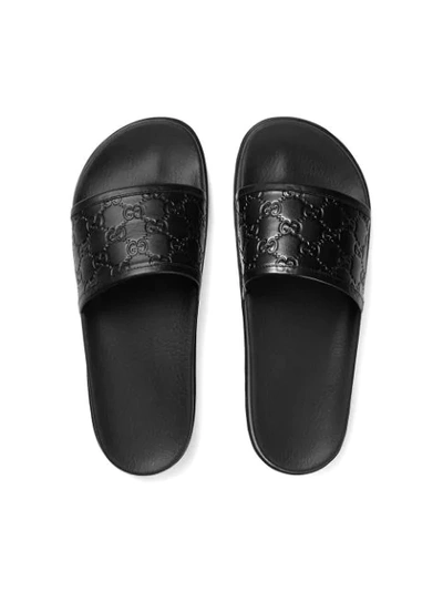 Shop Gucci Signature Slide Sandal In Black
