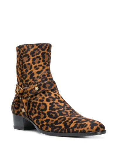 Shop Saint Laurent Wyatt Leopard Print Boots In Brown