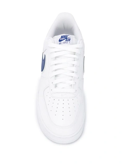 Shop Nike Air Force 1 Sneakers In White