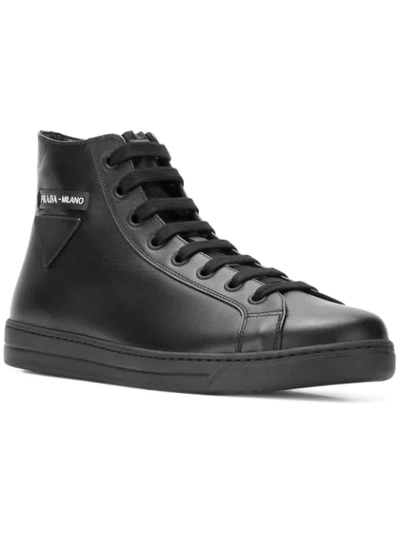 Shop Prada Logo Patch High Top Sneakers In Black