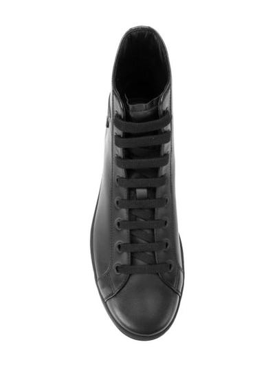 Shop Prada Logo Patch High Top Sneakers In Black