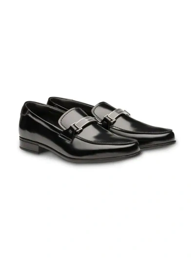 Shop Prada Brushed Leather Loafers In Black