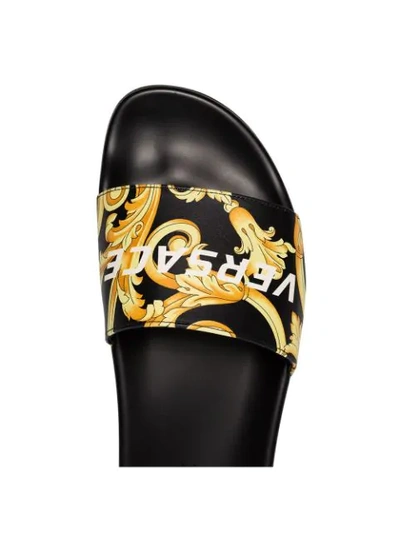 Shop Versace Printed Pool Slides - Black