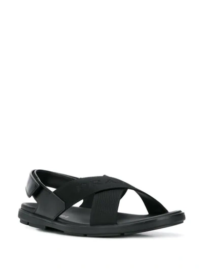 Shop Prada Cross Over Strap Sandals In Black