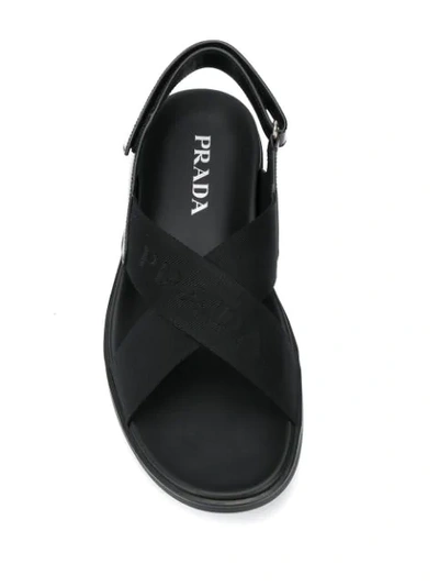 Shop Prada Cross Over Strap Sandals In Black