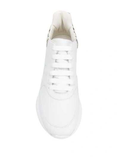 Shop Alexander Mcqueen Snakeskin Print Extended Sole Sneakers In White