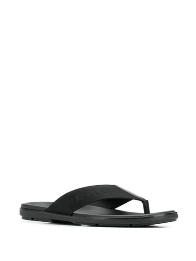 Shop Prada Logo Flip Flops In Black