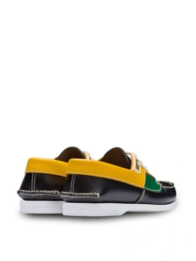 Shop Prada Brushed Leather Boat Shoes In Black ,yellow